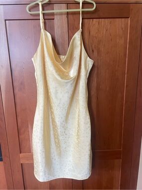 La Hearts Satin Slip Dress in a buttery yellow!